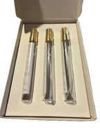 Open Reform gift box displaying three 10ML travel perfume pens in a fitted cream insert.