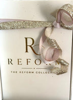 Reform 3-Pen Perfume Gift Set with pink Lumiere No. 2, blue Reserve No. 3, and teal Élan No. 5 travel fragrances.

