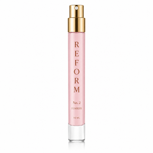 Lumiere No. 2 10ML travel perfume pen with a pink body and gold spray top on a white background.